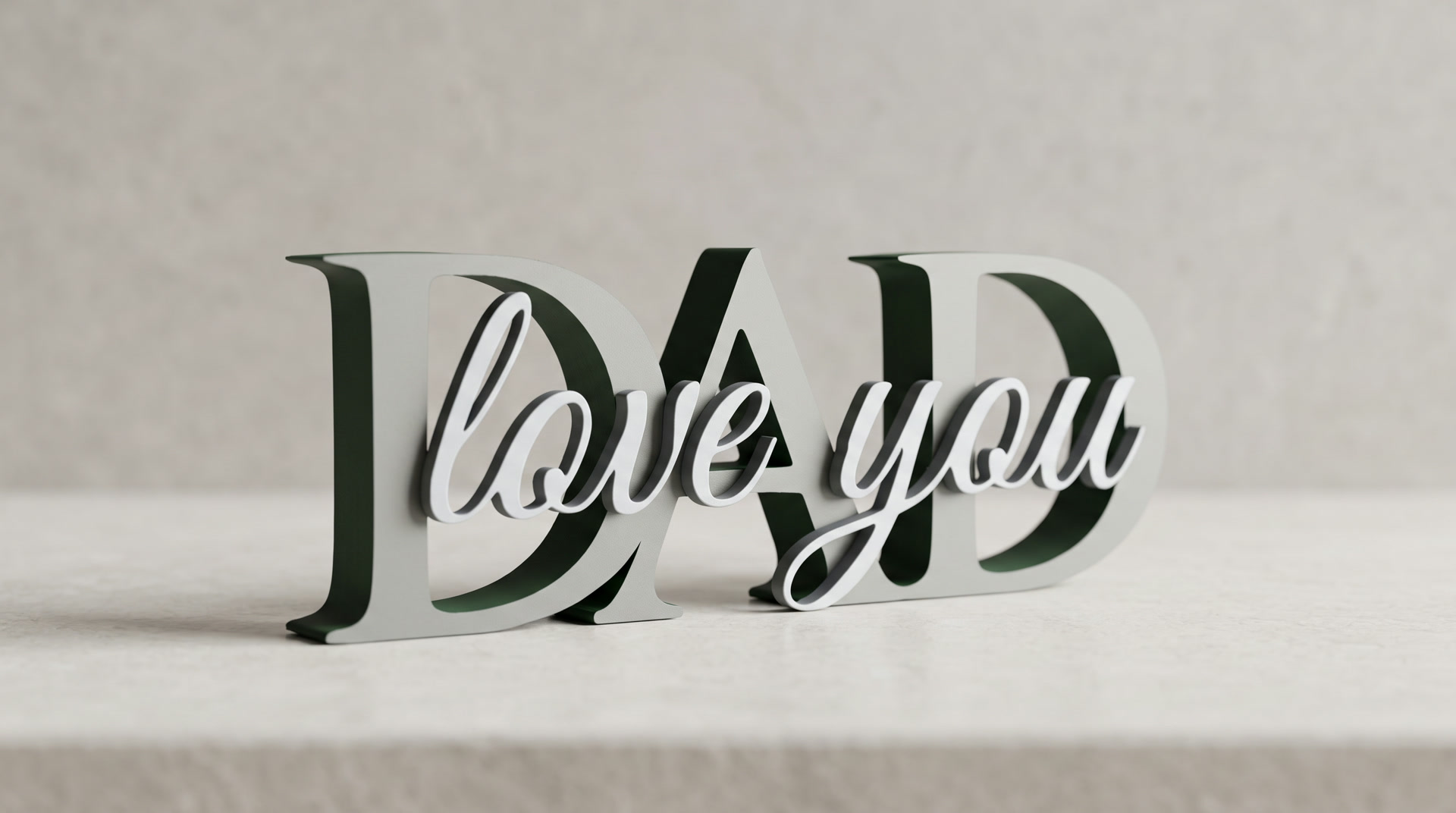 A freestanding printed sign reading DAD in large serif letters with I love you in white script across them.